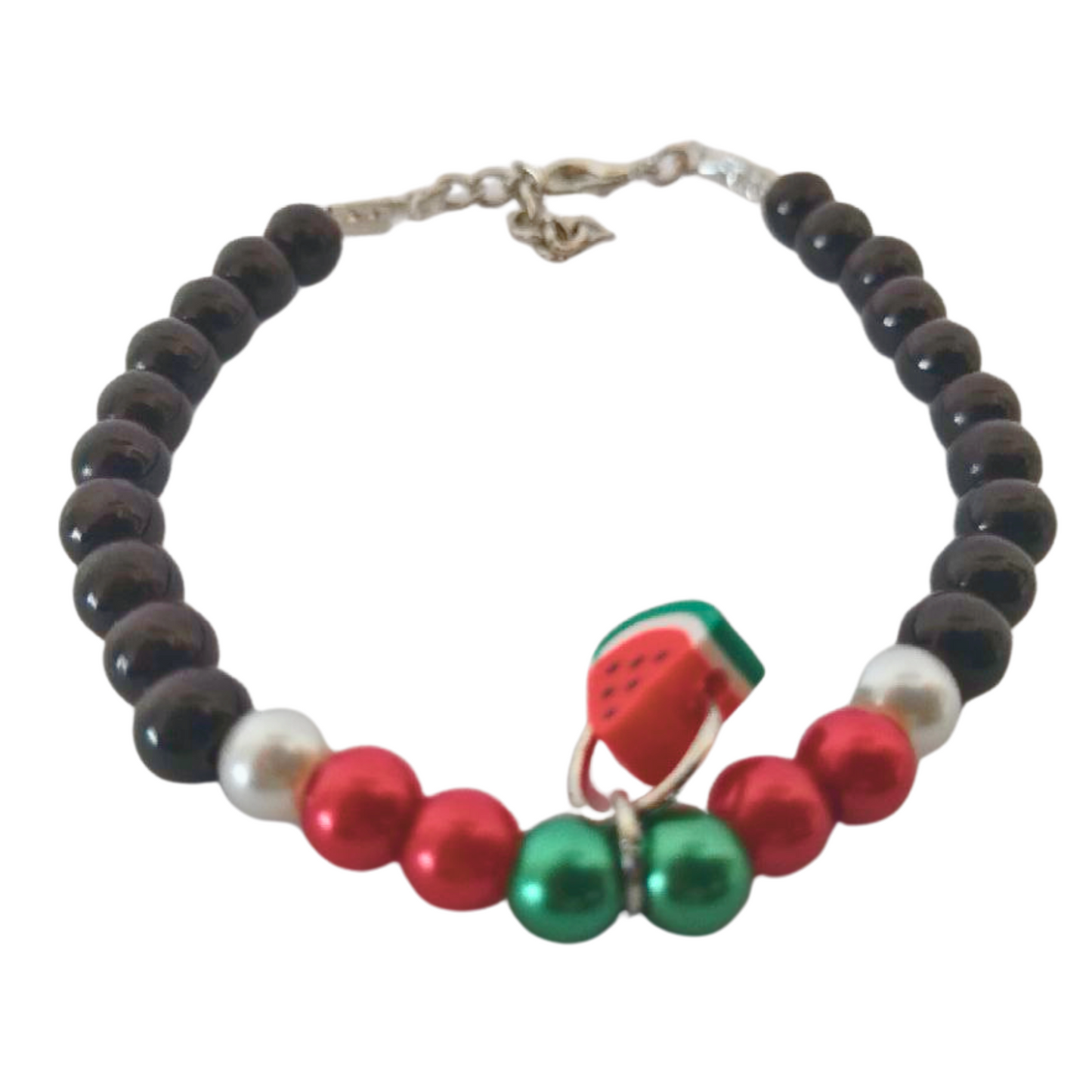 beaded bracelet with hint of red ,green and white beads and a watermelon charm on top
